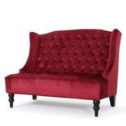 Noble House Nurturing upholstered loveseat with wingback design and diamond tufting, showcasing plush fabric and elegant style.