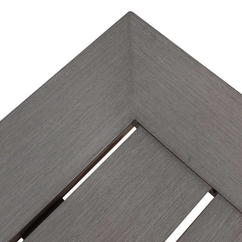 Dark gray Noble House modern aluminum outdoor dining bench with X base, showcasing sleek and durable design for outdoor seating.