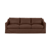 Classic Home Kipton upholstered stationary sofa with plush fabric and cushioned armrests in a modern living room setting.
