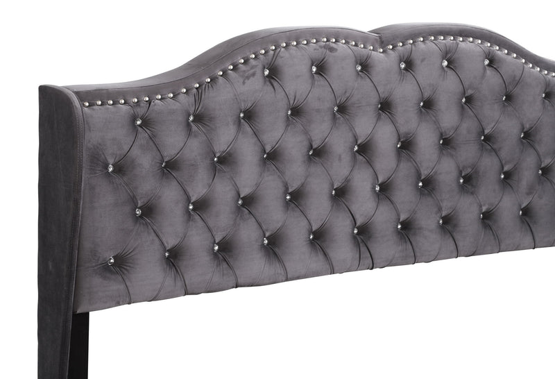 Transitional upholstered bed by Glory Furniture featuring a padded headboard and soft fabric in a cozy bedroom setting.