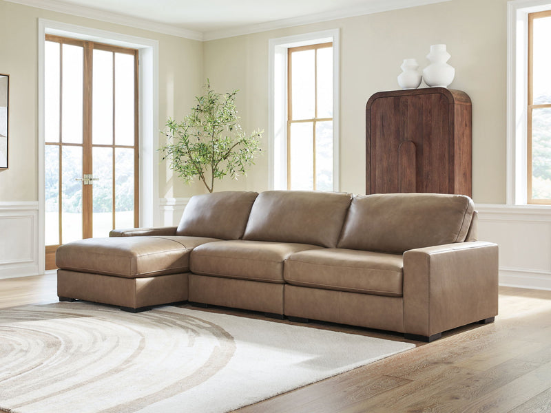 Benchcraft Veronella stationary sectional sofa with plush cushions and modern design in a neutral fabric.