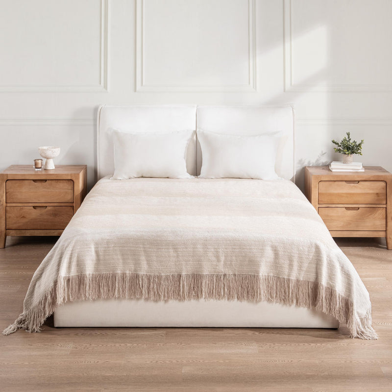 Classic Home Beryl blanket showcasing soft, cozy fabric in a neutral color, perfect for adding warmth to a living space.