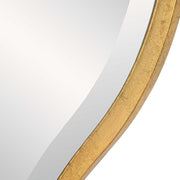 Uttermost Aneta round wall mirror with a sleek modern frame, hanging on a wall for stylish home decor.