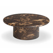 Dark brown TOV Furniture Byron round coffee table with sleek wooden finish and modern design on a neutral background.