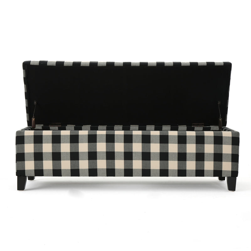 Black Noble House contemporary storage ottoman with cushioned seating and hidden storage compartment.