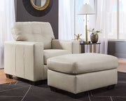Signature Design by Ashley Santorine living room set with stationary chair and ottoman, featuring plush upholstery and modern style.