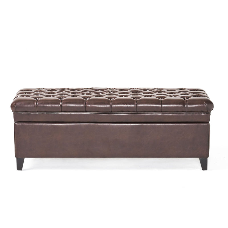Noble House Juliana storage ottoman with birch wood legs, upholstered in neutral fabric, showing a cushioned top and storage space inside.