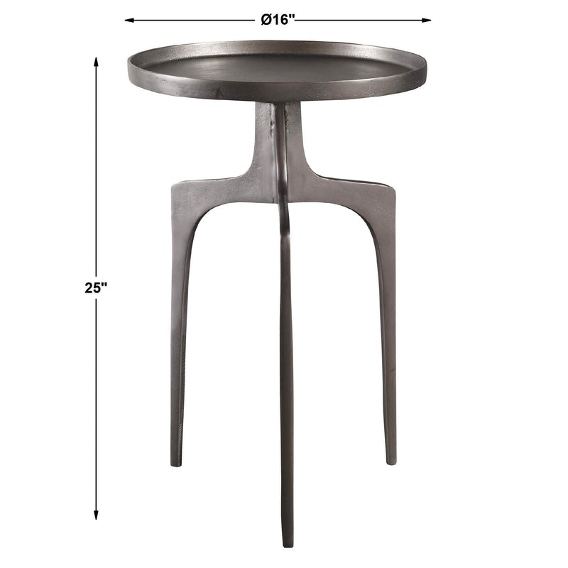 Uttermost Kenna accent table with a sleek metal frame and a round glass top, ideal for living room or bedroom decor.