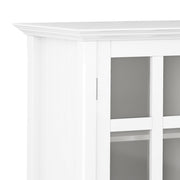 Handcrafted Acadian medium storage cabinet by Simpli-Home featuring a rustic wooden accent cabinet with doors and storage shelves.