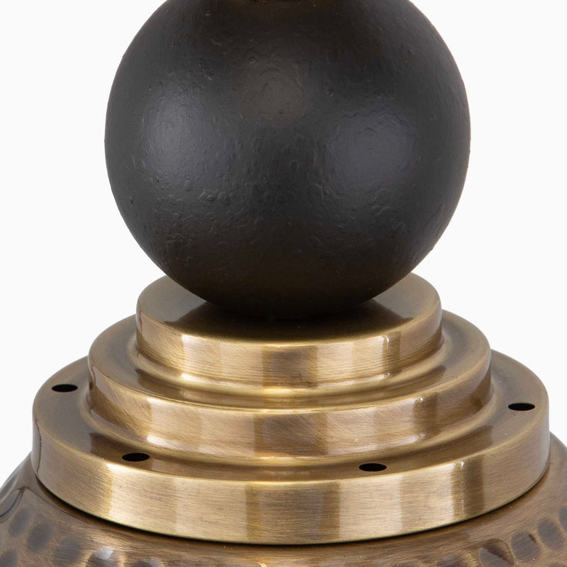 Uttermost Adastra 1-light pendant in antique brass with sleek modern design and clear glass shade, ideal for contemporary lighting.
