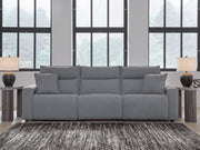 Modmax II reclining sectional in salt and pepper fabric by Signature Design by Ashley, showing plush cushions and reclining features.
