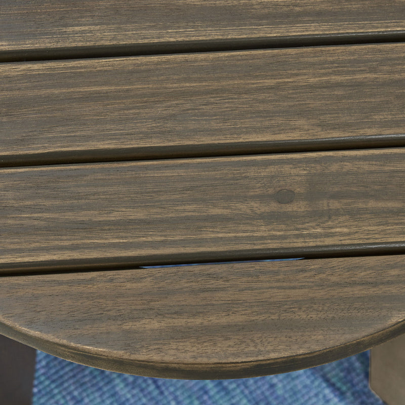 Noble House outdoor acacia wood side table with weather-resistant finish, featuring a sturdy surface and simple design for outdoor use.
