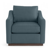 Classic Home Aspen accent arm chair with beige upholstery and wooden legs, showcasing a modern, comfortable design.