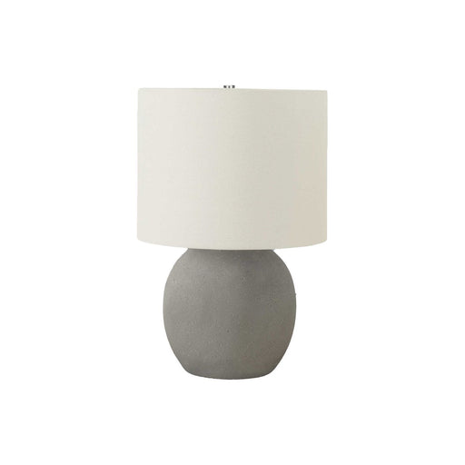 Contemporary gray and cream concrete table lamp by 8th Street, showcasing a modern design with a sleek, minimalist style.