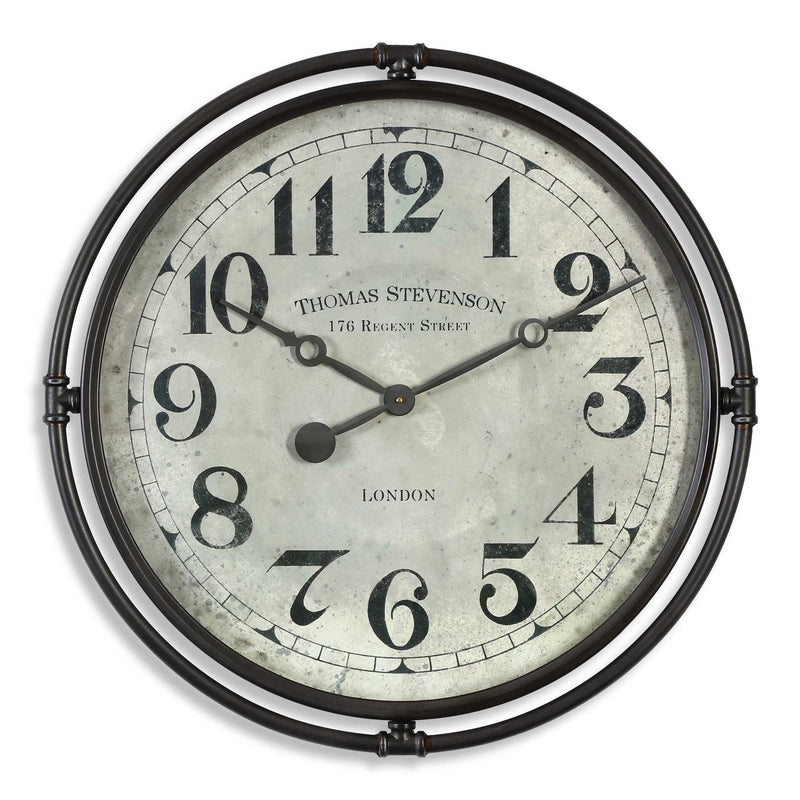 Nakul industrial wall clock by Uttermost with pearl silver finish, featuring a modern, circular design for contemporary home decor.