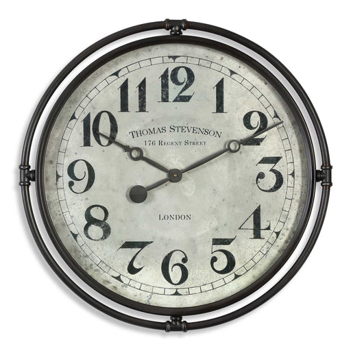 Nakul industrial wall clock by Uttermost with pearl silver finish, featuring a modern, circular design for contemporary home decor.
