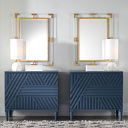 Uttermost Balkan iron wall mirror featuring a circular frame with intricate detailing and a vintage finish.