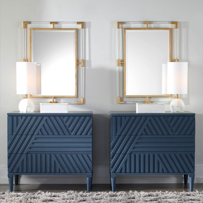 Uttermost Balkan iron wall mirror featuring a circular frame with intricate detailing and a vintage finish.