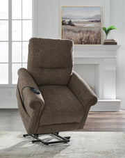 Signature Design by Ashley Aureta Power Lift Recliner showing plush upholstery and ergonomic design for added comfort.