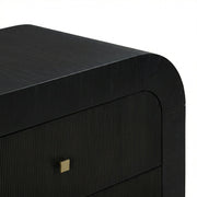 TOV Furniture Hump bedside chest with modern wooden finish and sleek drawers, ideal for bedroom storage and decor.