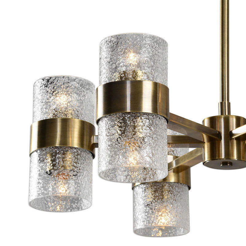 Uttermost Marinot 12-light gold chandelier with elegant cascading design and modern gold finish.