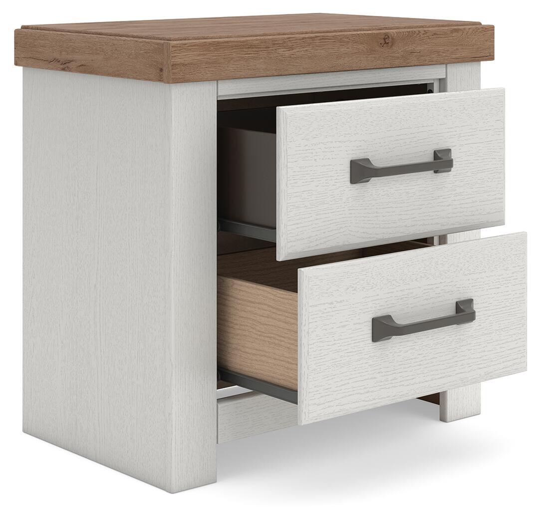 Benchcraft® white and brown two-drawer night stand with charging station, featuring sleek design and modern storage.