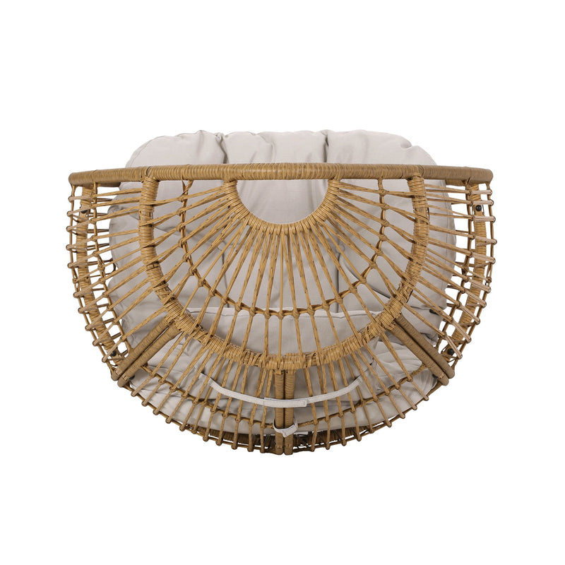 Noble House basket accent chair with teardrop shape and water-resistant cushion in natural finish, ideal for indoor or outdoor use.