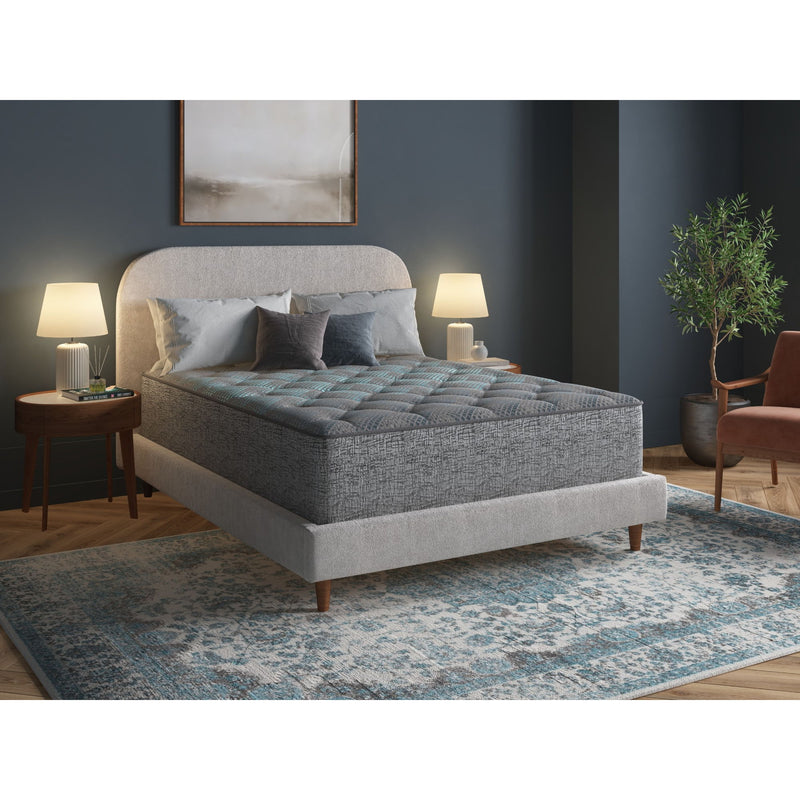 Restonic Comfort Care 12" hybrid Euro top twin mattress with plush comfort, gray and blue fabric, featuring individual pocketed coils.