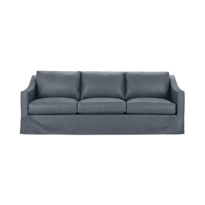 Classic Home Kipton upholstered stationary sofa with plush cushions and fabric upholstery in a cozy living room setting.