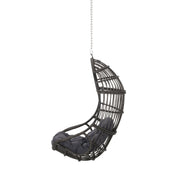 Rustic hanging basket chair with cushion by Noble House, featuring a woven rattan design and cozy seating for indoor or outdoor use.