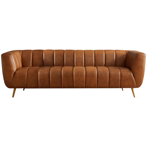Ashcroft Furniture Ava stationary sofa with gold and tan upholstery, featuring plush cushions and a modern design.