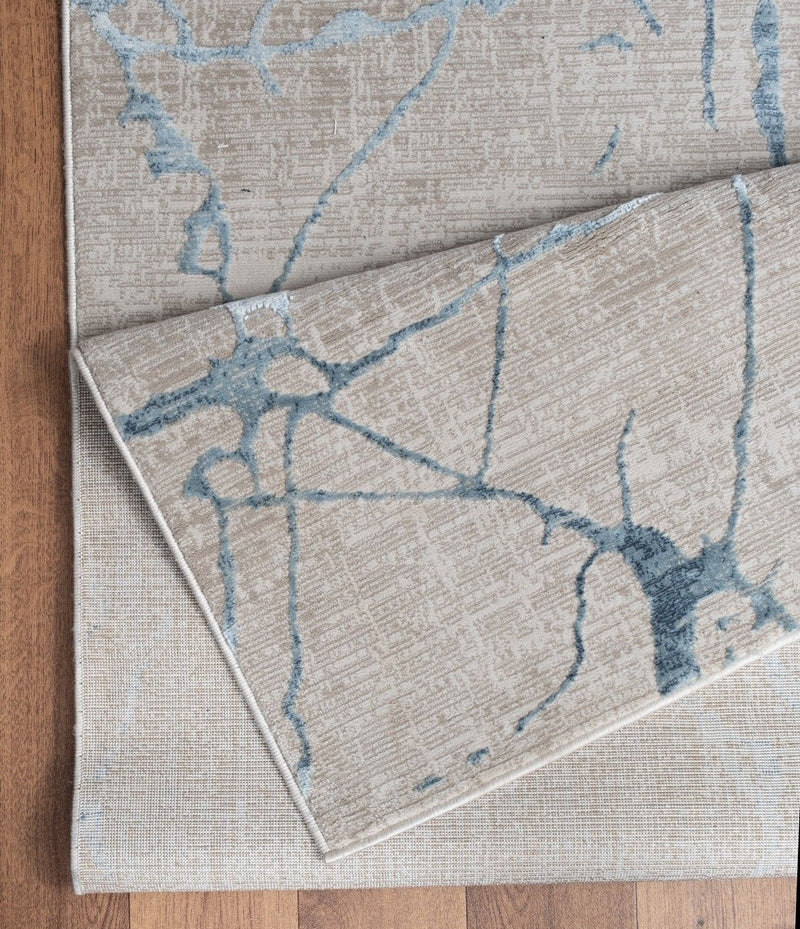 Elegance - 5'3" X 7'3" Area Rug - Blue, Polyester - R&R Furniture Gallery (Fountain Valley, CA)