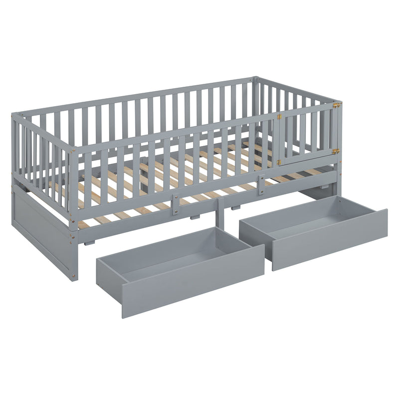 DreamHaus storage daybed with fence guardrails, two drawers, and split design as a floor bed and daybed, shown with neutral bedding.