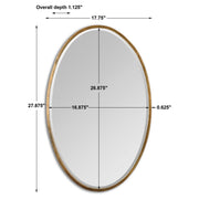 Uttermost Herleva gold oval wall mirror with a sleek, modern design, hanging on a wall for stylish home decor.