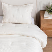 Classic Home Talia comforter set displayed on a bed with coordinating pillow shams, soft fabric and stylish design.