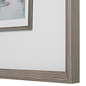 Watercolor framed print titled Morning Lake in blue by Uttermost, featuring a serene lakeside scene with a natural wooden frame.