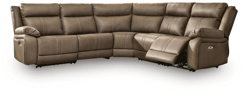 Signature Design by Ashley Max-Momentum reclining sectional sofa with plush cushions and reclining features in a modern living room setting.