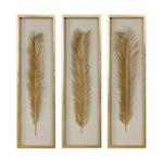 Set of three Uttermost Palma Leaf Shadow Box wall decor in gold with intricate leaf design on textured backgrounds.