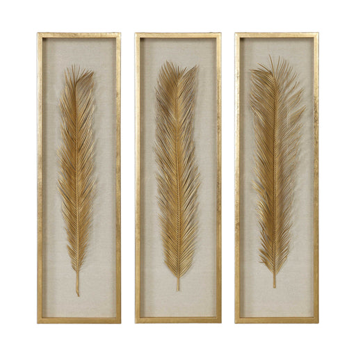 Set of three Uttermost Palma Leaf Shadow Box wall decor in gold with intricate leaf design on textured backgrounds.