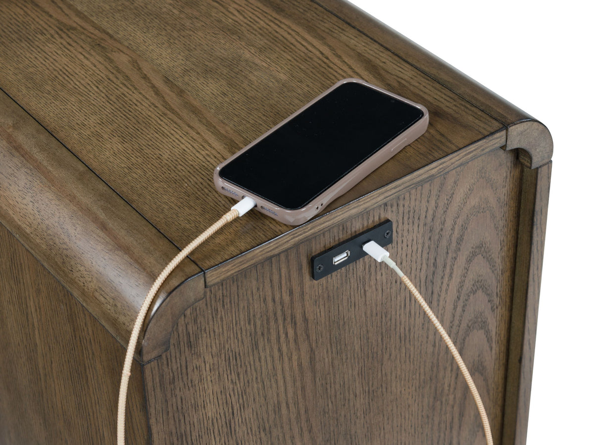 Brown Jensworth accent table from Signature Design by Ashley®, featuring a sleek round top and modern design.