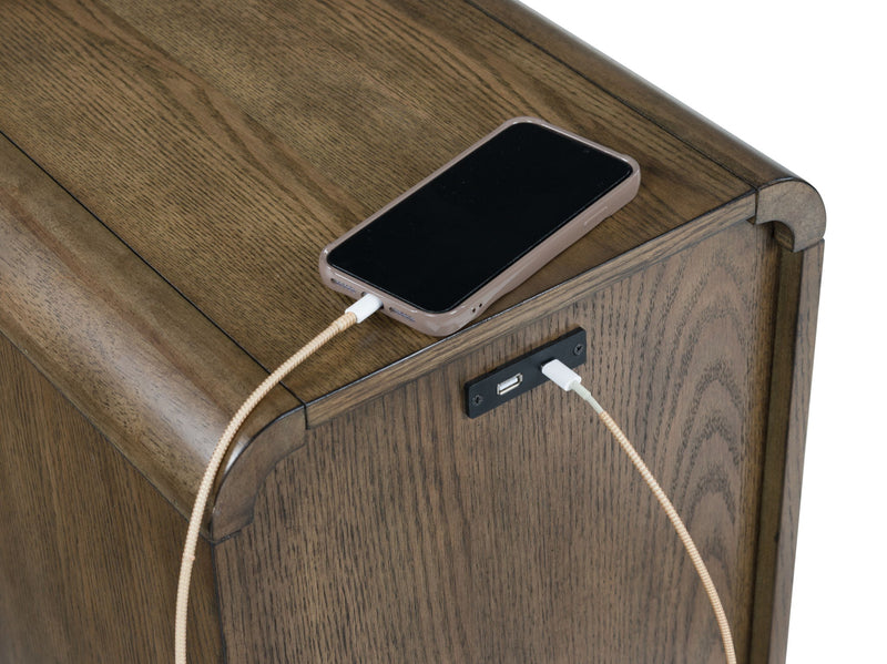 Brown Jensworth accent table from Signature Design by Ashley®, featuring a sleek round top and modern design.