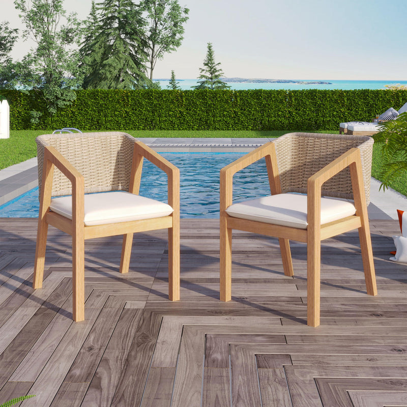 Set of two Noble House patio dining chairs in light teak wood with slatted backs and armrests, ideal for outdoor dining spaces.