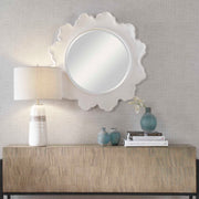 White round wall mirror with sea coral design from Uttermost, showcasing intricate coral patterns on a smooth surface.