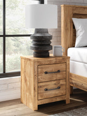 Brown Maystonna two-drawer nightstand from Signature Design by Ashley® with a sleek accent nightstand design and wood finish.