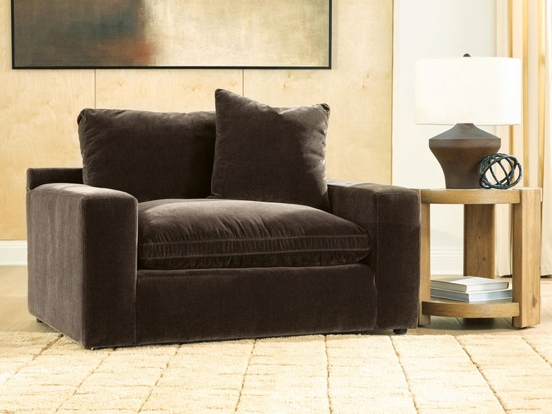 Benchcraft® Maxton Heights chair and a half arm chair with plush fabric and wide seating for comfortable lounging.
