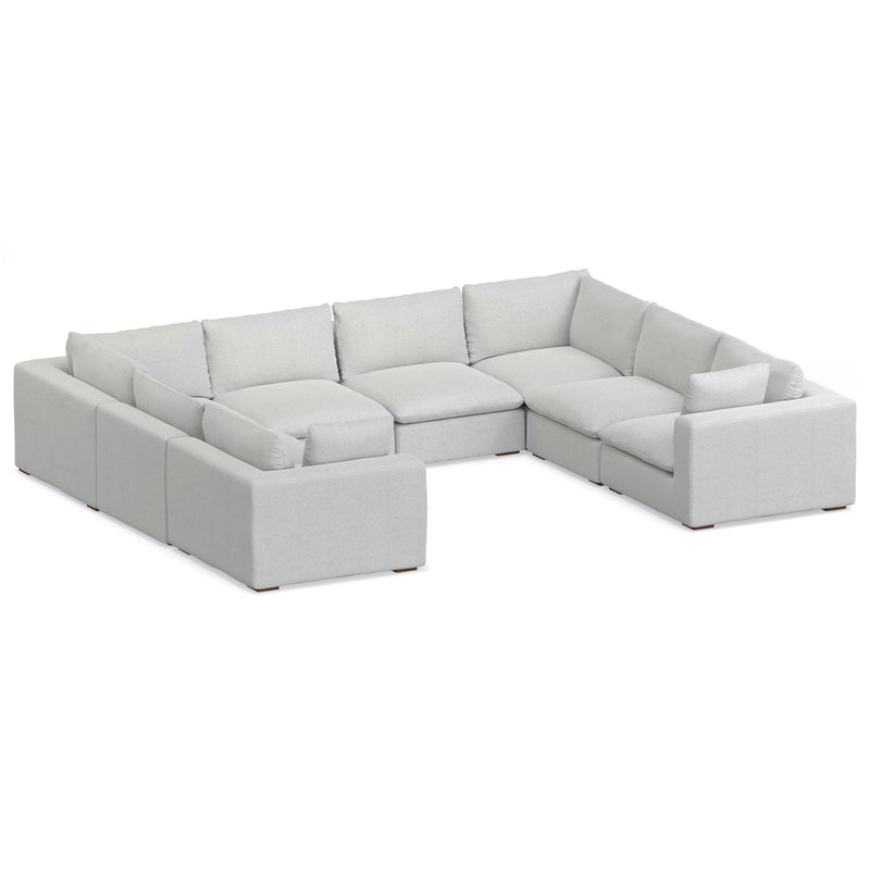 Handcrafted Jasmine sectional sofa by Simpli-Home, stationary sectional with plush cushions and modern design in a cozy living room setting.
