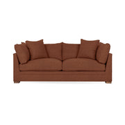 Classic Home Audrey stationary sofa with plush fabric and elegant design, showcased in a cozy living room setting.