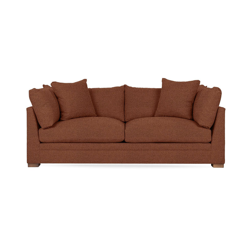 Classic Home Audrey stationary sofa with plush fabric and elegant design, showcased in a cozy living room setting.