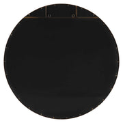 Uttermost Junius round wall mirror with a sleek frame, hanging on a wall, showcasing modern home decor.