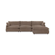 Classic Home Caplan modular sectional with plush fabric cushions and a modern design, shown in a cozy living room setting.